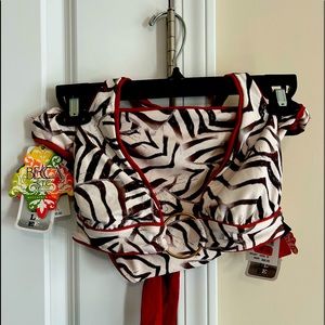 Brand new large Becca bathing suit. Purchased at Dillards with tags